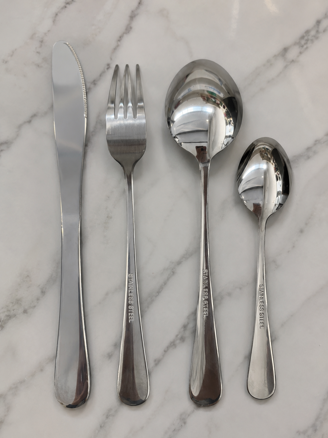 24-Piece Stainless Steel Cutlery Set with Display Stand